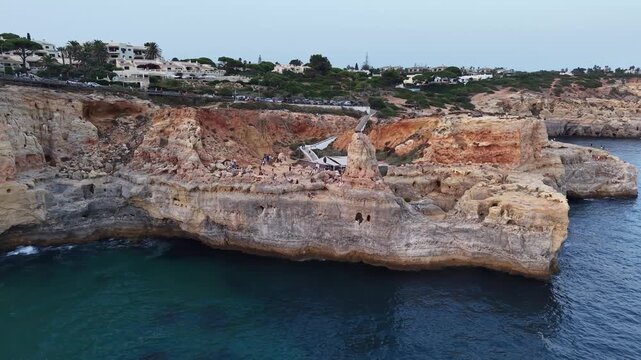 People visiting algar seco caves and cliffs