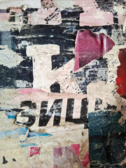 Torn and ripped street poster vintage collage artistic background © DaliCeMedia