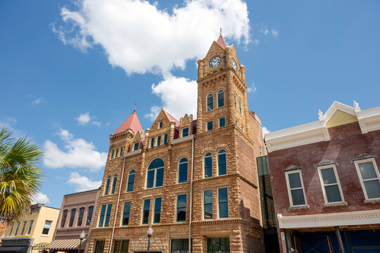 The historic 1893 Sumter Opera House with it's picturesque clock tower rising above Main Street in the small town of Sumter, South Carolina, Southeast USA.