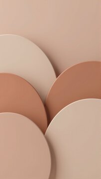 abstract composition four overlapping circles different shades pink beige circles arranged diagonal line topmost circle being largest bottom two being smallest background light peach color circles