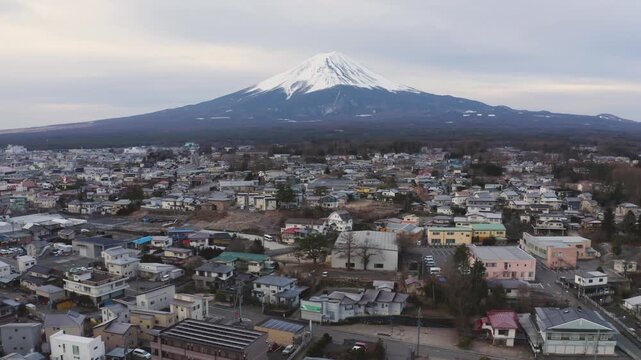 Telephoto Aerial View of Mount Fuji Above Fujikawaguchiko Townscape