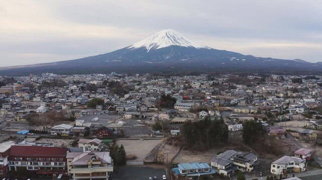 Aerial Telephoto View of Mount Fuji Above Fujikawaguchiko Town