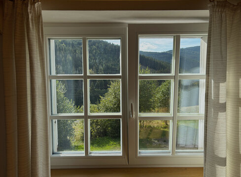 View of Lys&aacute; Hora and the Beskids through a window.