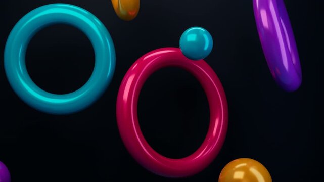 Colorful Glossy Rings and Spheres Floating in a Seamless 3D Loop