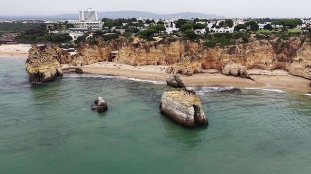 Aerial view of three brothers beach and alvor town in algarve portugal