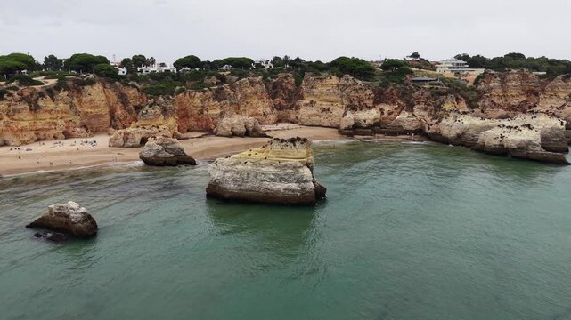 Aerial view of three brothers beach in alvor, portugal