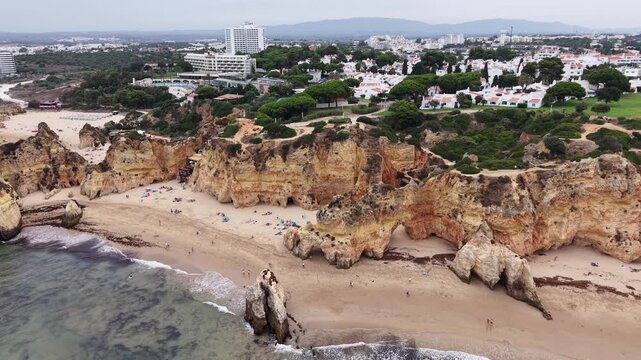Scenic aerial view of three brothers beach in alvor, portugal