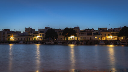 Obraz premium NIght View of Portocolom Harbor with Boats, Mallorca, Spain