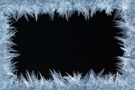 The Frozen Ice Frame Surrounding a Dark Center with Intricate Crystal Edges