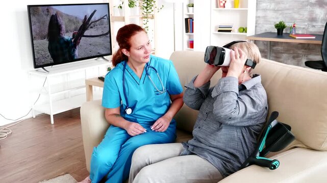 female nurse helps an older woman try a virtual reality headset, using immersive technology for recreation, engagement and digital inclusion in senior care, with added focus on caregiving.