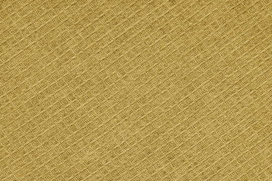 Texture of yellow waffle weave kitchen towel. Cloth, fabric with checked diagonal grid pattern. Close up, macro, detailed textile background, woven material structure, natural cotton material.