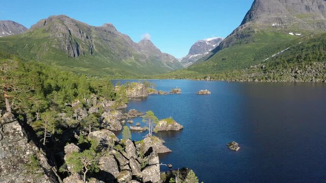 Drone video, Lake Litlvatnet in Innerdalen high valley, Innerdalst&aring;rnet mountain area, Sunndal, M&oslash;re og Romsdal, Vestlandet, Norway
