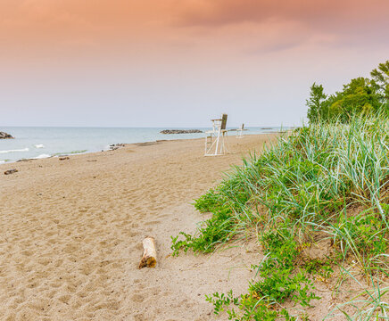 Cloudy Evening Light on The Sandy Shores of Presque Beach on Lake Erie, Presque Isle State Park, Pennsylvania, USA