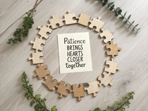 Wooden puzzle pieces forming a circle around a quote about patience