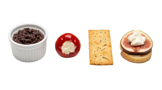 Tapenade, stuffed pepper, cracker, fig crostini isolated on transparent background png