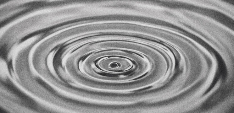 Concentric ripples in water surface texture
