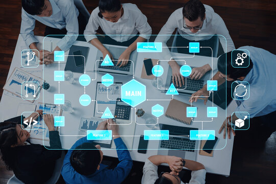 Collaborative Business Meeting Displaying Digital Workflow and Data Analysis with Professionals Engaged in Strategic Planning and Technology Integration Quark.