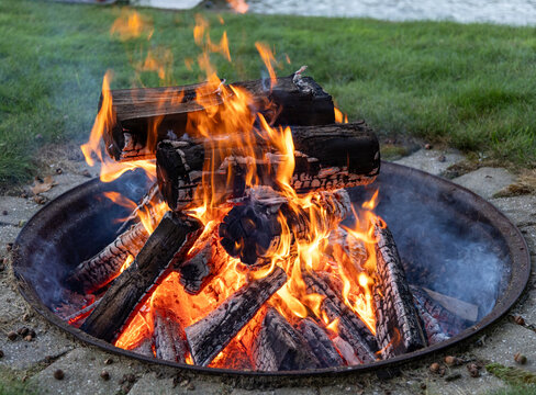 Campfire with grass in background
