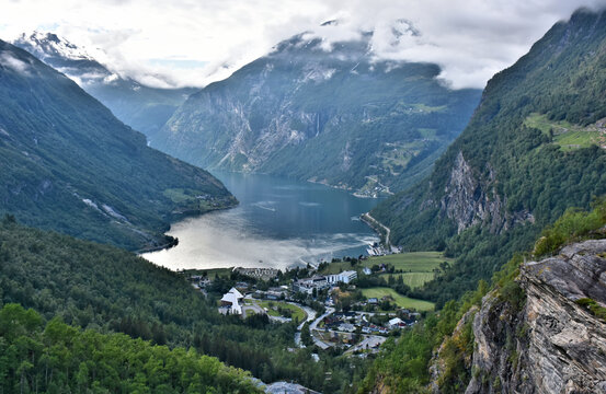 Aerial view of Geiranger - small tourist village at the end of the Geirangerfjorden.  Sunnmore region of More og Romsdal county in the western part of Norway. Geiranger - home to spectacular scenery, 