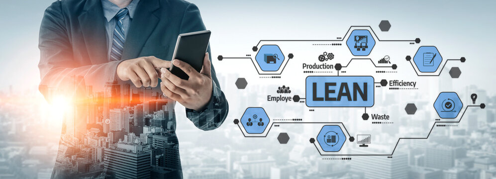 A business professional engages with lean management strategies using a tablet in a modern urban setting, illustrating efficiency and production optimization. Tessel