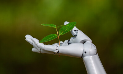 Obraz premium Robot hand with plant. Robot hand with plant. Green technology and AI. Robotic hand and environment. Eco biotech concept. Growing plant in robot hand on green background. Environmental technology.