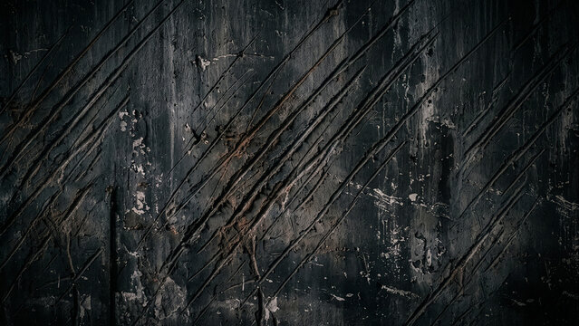 Dark distressed concrete wall texture with deep diagonal scratch marks