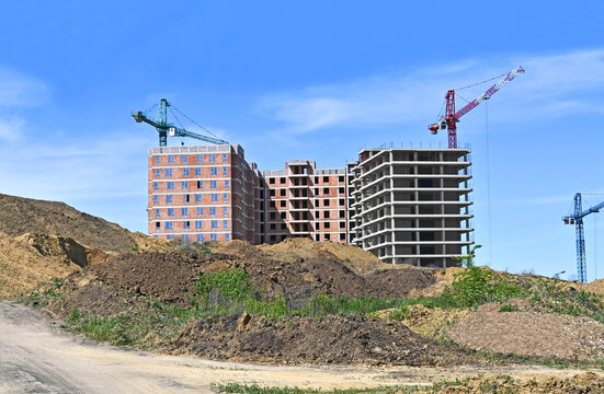 Construction of new house and mounds of soil