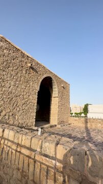 Ancient stone architecture of the sacred Al Fath Mosque, a historic cultural landmark in Medina.