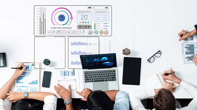 A collaborative workspace featuring a modern business dashboard with data visualization, charts, and diverse hands working on analytics tools to enhance teamwork and project management. Raster
