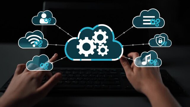 Hands Interacting with Laptop Displaying Cloud Computing Icons and Gears Representing Digital Technology and Online Data Management Solutions. Entropy.