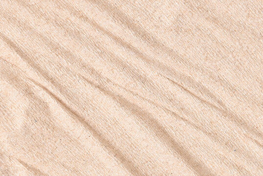 Background made of wrinkled recycled toilet paper