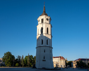 Obraz premium Vilnius, Lithuania – Close view of the historic Bell Tower in Cathedral Square on a bright sunny morning. This iconic architectural landmark is a vital part of the city's cultural heritage.