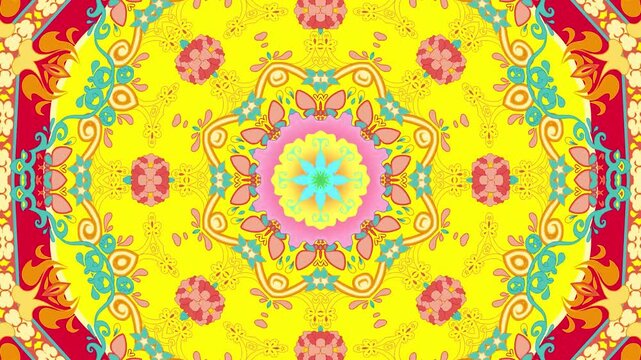 Vibrant colorful kaleidoscopic mandala pattern animation with floral and scroll motifs rotating symmetrically