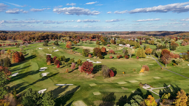 Aerial View of a Golf Course in Autumn with Colorful Fall Foliage in Greenville, Delaware