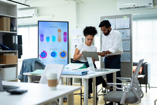 group of business people partners during a set team meeting in the office.business team meeting conference discussion with colleagues private ideas data report analysis,presentation,planning,strategy
