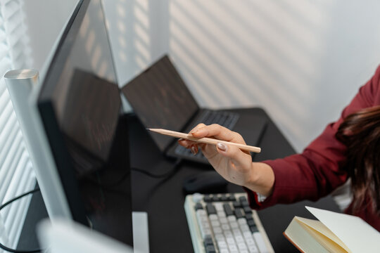 Professional financial market analysis in a modern office, showing investment research, stock market monitoring, technical chart evaluation, and strategic trading decisions for business growth.