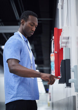 IT Professional Using Access Control System at Secure Data Center