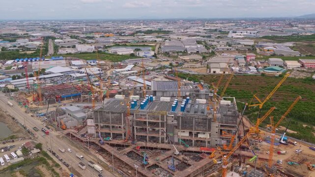 Aerial perspective of a large scale hyperscale data center construction project, a crucial infrastructure for ai and cloud computing services