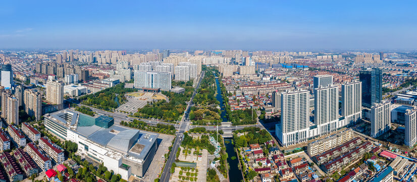 Aerial Panorama of Modern Urban City with Central Waterway