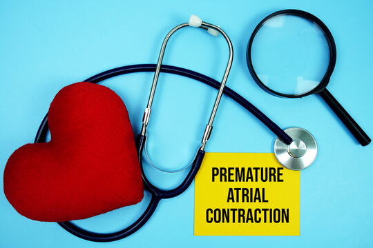 Premature Atrial Contraction (PAC) text with stethoscope and red heart on blue background