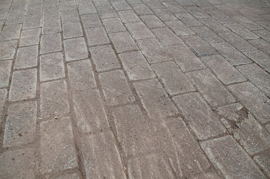 Grey concrete paving blocks background texture