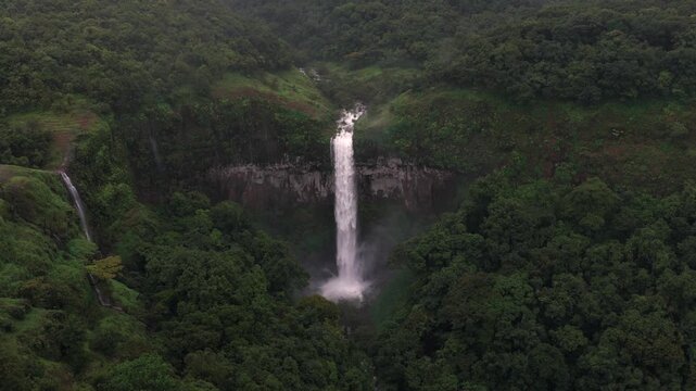 Aerial View of Barki Waterfall Amid Lush Green Forest Kolhapur Maharashtra