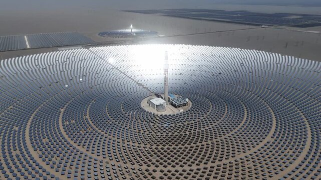 panoramic view of a tower solar thermal power station in the desert
