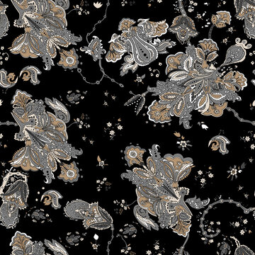 Glittering silver and gold floral pattern on black background