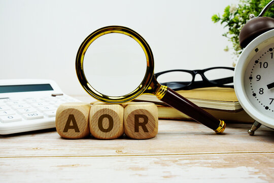 AOR Agency of Record alphabet letters with magnifying glass, calculator and alarm clock