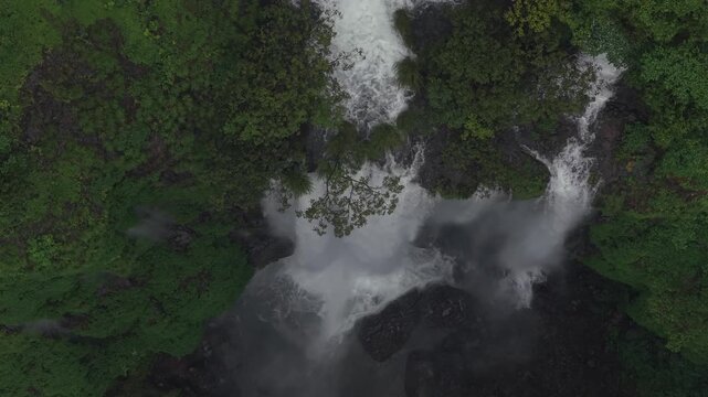 Aerial View of Barki Waterfall Amid Lush Green Forest Kolhapur Maharashtra