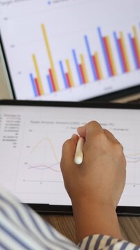 slow motion scene employee woman check performance and summary report of company at office board room for business and industry concept