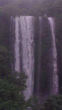 Vertical Aerial View of Barki Waterfall Amid Lush Green Forest Kolhapur Maharashtra
