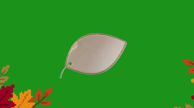 Blank leaf shaped price tag scaling up with retro pixelated autumn leaves in corners on a chroma key green screen background for easy seasonal compositing