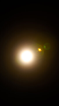 Sun flare on the black background
